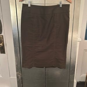 A Gucci dark brown skirt with brass buttons
